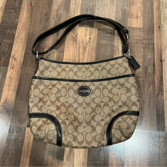 Coach Handbags - Coach Tan and Black Signature Shoulder Bag